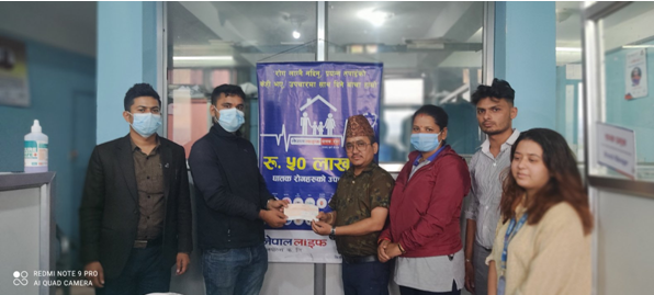नेपाल लाइफद्धारा घातक रोग वापत ६ लाख रुपैयाँ दाबी रकम हस्तान्तरण