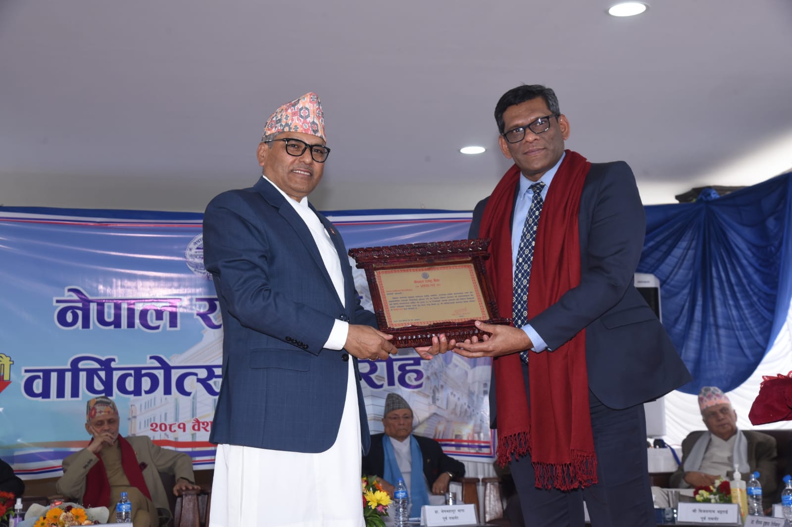 रेमिट्यान्स भित्र्याउन उल्लेखनीय योगदान गरेकोमा नेपाल एसबिआई बैंक सम्मानित